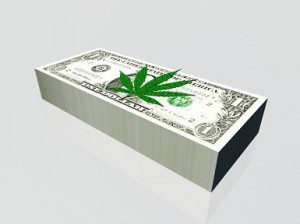 Pile of US currency and marijuana leaf