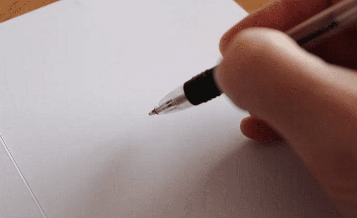 hand writing a letter